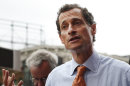 New York City mayoral hopeful Anthony Weiner speaks to reporters during a campaign event, Thursday, May 23, 2013 in New York. Weiner, who ran for mayor in 2005 and nearly did in 2009, is getting into the race to succeed three-term Mayor Michael Bloomberg about two years after a series of tawdry tweets, and obfuscating explanations that capsized his promising congressional career. (AP Photo/Jason DeCrow)