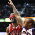 Chicago Bulls' Richard Hamilton, left, is fouled in the face by Phoenix Suns' P.J. Tucker (17) during the first half of an NBA basketball game, Wednesday, Nov. 14, 2012, in Phoenix. (AP Photo/Ross D. Franklin)