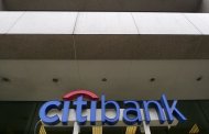 The Citibank logo is seen at branch in Washington in this April 18, 2011 file photo. REUTERS/Larry Downing