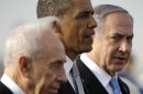 President Barack Obama walks on the tarmac with Israeli Prime Minister Benjamin Netanyahu, right, and Israeli President Shimon Peres, left, prior to his departure from Ben Gurion International Airport in Tel Aviv, Israel, Friday, March 22, 2013, (AP Photo/Pablo Martinez Monsivais)
