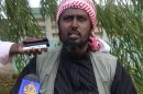 Al-Shebab spokesman Ali Mohamud Rage speaks during a press conference near Afgoye, Somalia on October 17, 2011