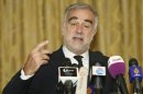 International Criminal Court (ICC) war crimes prosecutor Luis Moreno-Ocampo gestures during a news conference in Tripoli