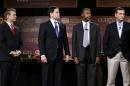 Republican presidential candidates, from left, Sen. Rand Paul, R-Ky., Sen. Marco Rubio, R-Fla., Ben Carson and Sen. Ted Cruz, R-Texas, stand on stage during the Presidential Family Forum, Friday, Nov. 20, 2015, in Des Moines, Iowa. (AP Photo/Charlie Neibergall)