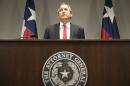 FILE - In this May 25, 2016, file photo, Republican Texas Attorney General Ken Paxton announces Texas' lawsuit to challenge President Obama's transgender bathroom order during a news conference in Austin, Texas. A federal judge in Texas is blocking for now the Obama administration's directive to U.S. public schools that transgender students must be allowed to use the bathrooms and locker rooms consistent with their chosen gender identity. Paxton had argued that halting the law before school began was necessary because districts risked losing federal education dollars if they didn't comply. (Jay Janner/Austin American-Statesman via AP)