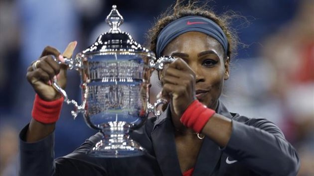 Serena Williams of the U.S. raises her trophy after defeating Victoria Azarenka of Belarus in their women's singles final match at the U.S. Open (Reuters)