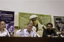 Members of the FARC rebel group attend a news conference in Havana