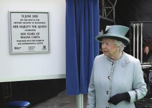 Britain&#39;s Queen Elizabeth II unveils a plaque at&nbsp;&hellip;