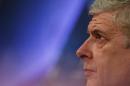 Arsenal's head coach Arsene Wenger speaks at a press conference in Munich, southern Germany, on March 10, 2014