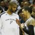 Spurs' Green is congratulated by teammate Duncan as he comes out of the game against the Heat during Game 3 of their NBA Finals basketball playoff in San Antonio