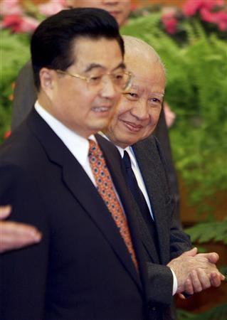 File photo of then Cambodian King Norodom Sihanouk accompanied by Chinese President Hu Jintao attending a reception at the Great Hall of the People in Beijing