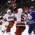 Hurricanes' Dwyer celebrates his goal with teammate Skinner in front of Maple Leafs' Riemsdyk during the third period of their NHL hockey game in Toronto