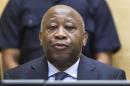 A file picture taken on February 19, 2013 shows former Ivorian President Laurent Gbagbo attending a pre-trial hearing on charges of crimes against humanity at the International Criminal Court in The Hague