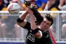 Sam Dickson of New Zealand vies for the ball against Kenya during day two of the Men's 2016 USA Sevens Rugby Tournament match at the Sam Boyd Stadium in Las Vegas, Nevada on March 5, 2016