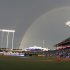FILE - In this Wednesday, June 16, 2010, file photograph, a rainbow arches near Kauffman Stadium as the grounds crews prepare the field after a rain delay before a baseball game between the Kansas City Royals and the Houston Astros, in Kansas City, Mo. Kauffman Stadium recently underwent a $250 million renovation in part to lure the All-Star game back to Kansas City, and commissioner Bud Selig officially awarded the game on June 16, 2010. (AP Photo/Ed Zurga, File)