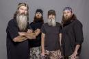 This 2012 photo released by A&E shows, from left, Phil Robertson, Jase Robertson, Si Robertson and Willie Robertson from the A&E series, "Duck Dynasty." The A&E channel says "Duck Dynasty" patriarch Phil Robertson is off the show indefinitely after condemning gays as sinners in a magazine interview. In a statement Wednesday, Dec. 18, 2013, A&E said it was extremely disappointed to read Robertson's comments in GQ magazine. (AP Photo/A&E, Zach Dilgard)