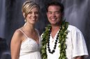 FILE - This 2008 file image released by TLC, shows Jon Gosselin, right, and his wife Kate Gosselin, from the TLC series "Jon & Kate Plus 8," in Hawaii. Kate Gosselin has filed a lawsuit accusing her ex-husband, Jon, of stealing her hard drive and hacking into her phone and computer to get material for a tell-all book. The federal lawsuit says he took the material for a book called "Kate Gosselin: How She Fooled the World." The suit, filed Monday, Aug. 26, 2013, in Philadelphia, says the book was written by her ex-husband's friend, tabloid writer Robert Hoffman, but has since been pulled from Amazon because the material was obtained illegally. (AP Photo/TLC, Mark Arbeit)
