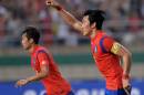 South Korea's Jang Hyun-Soo (R) celebrates after scoring against Japan during their Asian Games quarter-final in Incheon on September 28, 2014