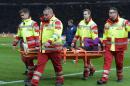 England's goalkeeper Jack Butland is carried off on a stretcher during the friendly football match Germany vs England at the Olympic Stadium in Berlin on March 26, 2016