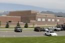 The Wasatch High School is shown Thursday, May 29, 2014, in Heber City, in Utah. A group of Utah high school students said they were shocked and upset to discover their school yearbook photos were digitally altered, with sleeves and higher necklines drawn on to cover up bare skin. Several students at Wasatch High School in Heber City say that their outfits did meet the school dress code and they've worn them on campus many times. (AP Photo/Rick Bowmer)