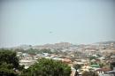 A Nigerian military helicopter encircles over Jos, the capital of Plateau State on April 19, 2011 during a security operation