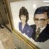 A portrait of Sue and Joe Paterno by artist Bill Rettig hangs in the Pattee and Paterno Library on the main campus of Penn State University in State College, Pa., Friday, July 13, 2012.  After an eight-month inquiry, Former FBI director Louis Freeh's firm produced a 267-page report that concluded that Paterno and other top Penn State officials hushed up child sex abuse allegations against former Penn State assistant football coach Jerry Sandusky for more than a decade for fear of bad publicity, allowing Sandusky to prey on other youngsters. (AP Photo/Gene J. Puskar)