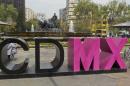 Mexico City changes its official name from "DF", Distrito Federal, to Ciudad de Mexico, or CDMX
