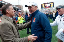 AD Mike Thomas (L) fired coach Tim Beckman Friday, one week before Illinois' season opener. (AP)