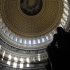 A statue of the United States first President, George Washington, is seen under the Capitol dome in Washington