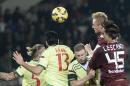 Torino' s Kamil Glik, second from right, scores a goal during a Serie A soccer match between Torino and AC Milan at the Olympic stadium, in Turin, Italy, Saturday, Jan. 10, 2015. (AP Photo/Massimo Pinca)