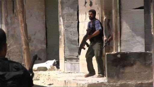 Fighting in Syria's Aleppo as raids target Al Bab.