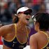 China's Xue Chen and Zhang Xi celebrate a point against Russia's Ekaterina Khomyakova and Evgeniya Ukolova during their women's round of 16 beach volleyball match at Horse Guards Parade during the London 2012 Olympic Games