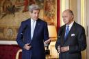 French Foreign Minister Laurent Fabius and US Secretary of State John Kerry speak during a joint statement at the Quai d'Orsay Foreign Affairs ministry in Paris
