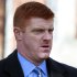 FILE - In this Jan. 25, 2012 file photo, former Penn State assistant football coach Mike McQueary arrives at the Pasquerilla Spiritual Center on the Penn State campus for the funeral service of former Penn State football coach Joe Paterno in State College, Pa. McQueary, the former Penn State graduate assistant who says he saw former assistant football coach Jerry Sandusky showering with a boy in 2001 and testified against him has sued the university for what he says is defamation and misrepresentation. His whistle-blower complaint was filed Tuesday, Oct. 2, 2012.  (AP Photo/Jacqueline Larma, File)
