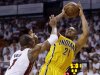 Indiana Pacers forward David West (21) attempts a basket over Miami Heat defender Chris Bosh (1) during the first half of Game 2 in their NBA basketball Eastern Conference finals playoff series, Friday, May 24, 2013, in Miami. (AP Photo/Lynne Sladky)