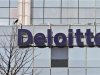 The Deloitte Company logo is seen on a commercial tower at Gurgaon, on the outskirts of New Delhi
