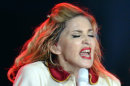 In this picture taken Aug. 18. 2012, US singer Madonna performs one stage during a concert in Zurich, Switzerland. (AP Photo/Keystone/Walter Bieri)