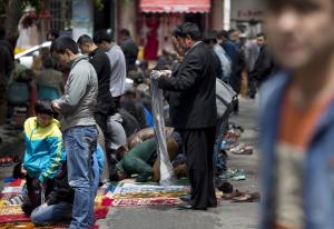 Ethnic Uighurs prepare for their Friday prayers outside&nbsp;&hellip;