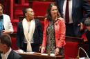 French minister for Ecology, Sustainable Development and Energy Segolene Royal and Justice minister Christiane Taubira attend the questions to the government session at the National Assembly in Paris