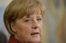 German Chancellor Merkel speaks to the media during a visit at a retirement home in Melle