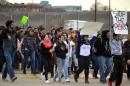Hundreds of Albuquerque High School students stage a walkout in Albuquerque, N.M. on Monday, March 2, 2015, to protest a new standardized test they say isn't an accurate measurement of their education. Students frustrated over the new exam walked out of schools across the state Monday in protest as the new exam was being given. The backlash came as millions of U.S. students start taking more rigorous exams aligned with Common Core standards. (AP Photo/Russell Contreras)