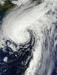 This visible image of Hurricane Rafael in the North Atlantic was taken from the MODIS instrument aboard NASA's Terra satellite on Oct. 17 at 1440 UTC (10:40 a.m. EDT). Rafael's northwestern fringe clouds were brushing Nova Scotia, Canada (top l