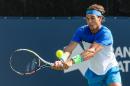 Rafael Nadal of Spain returns the ball during day one of the Rogers Cup on August 10, 2015 in Montreal, Quebec, Canada