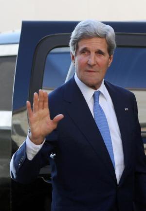 US Secretary of State John Kerry waves as he arrives …