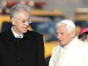 Pope Benedict XVI is welcomed by the Italian Premier Mario Monti, left, as he arrives to board a plane to Benin, at Fiumicino international airport, near Rome, Friday, Nov. 18, 2011. Pope Benedict XVI had his first meeting with Italy's new leader on the tarmac of Rome's airport just before taking off for a trip to Africa. Premier Mario Monti greeted the pope as Benedict descended from the helicopter that brought him from the Vatican to Rome's airport. They chatted as they walked slowly across the tarmac to the pope's waiting plane. Benedict then took off for the west African nation of Benin for a three-day visit where he will speak of the role of the church in Africa. (AP Photo/Riccardo De Luca)