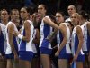 Russia's players huddle around their coach Sergei Ovchinnikov during their women's Group A volleyball match against Britain at the London 2012 Olympic Games at Earls Court in London