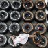 McLaren mechanic arranges Pirellis tyres in the paddock ahead of the Spanish F1 Grand Prix in Montmelo