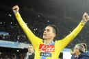 Napoli's José Callejón, who scored first goal, celebrates at the end of an Italian Cup, semifinal return match, between AS Roma and Napoli, at the San Paolo stadium in Naples, Italy, Wednesday, Feb. 12, 2014. Napoli won 3 - 0 to advance to the final. (AP Photo/Salvatore Laporta)