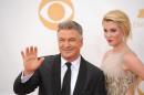 Actor Alec Baldwin (L) and daughter model Ireland Baldwin arrive on the red carpet for the 65th Emmy Awards in Los Angeles on September 22, 2013