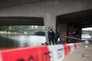 Police under a bridge in Hamburg on October 17, 2016, a day after a teenager was stabbed in an attack claimed by IS group