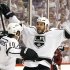 Los Angeles Kings' Dwight King (74) celebrates his goal against the Phoenix Coyotes with teammate Mike Richards (10) during the second period of Game 1 of the NHL hockey Stanley Cup Western Conference finals, Sunday, May 13, 2012, in Glendale, Ariz.(AP Photo/Ross D. Franklin)